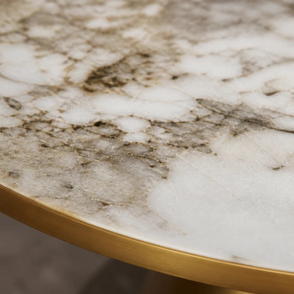 1:1 macro photograph isolating the stone surface of the Kidoludo Table Basse Extensible. Focus on th
