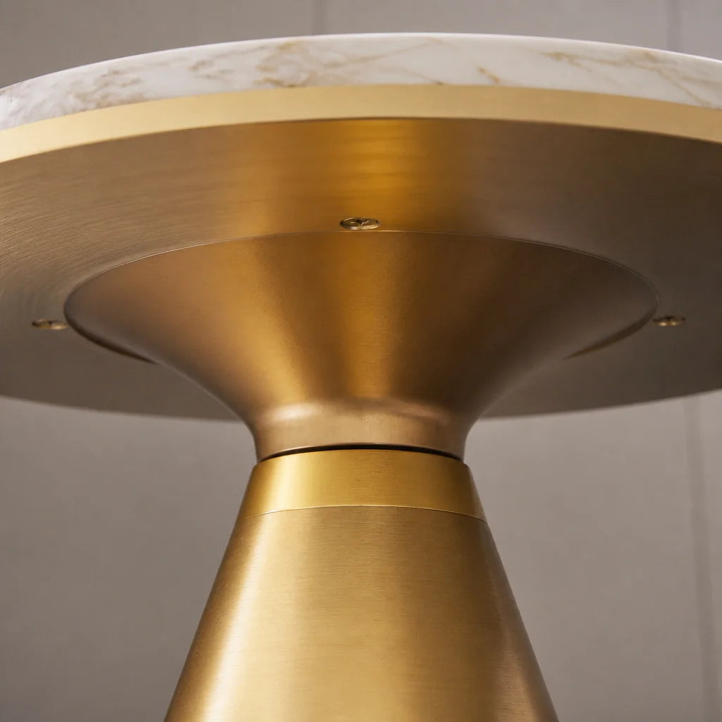 1:1 macro of the underside joint between the metal base and the stone top of the Kidoludo Table Bass